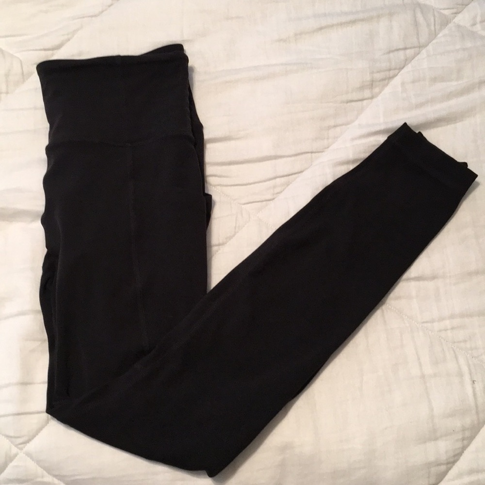 Athleta Black leggings with wide pockets Size XS